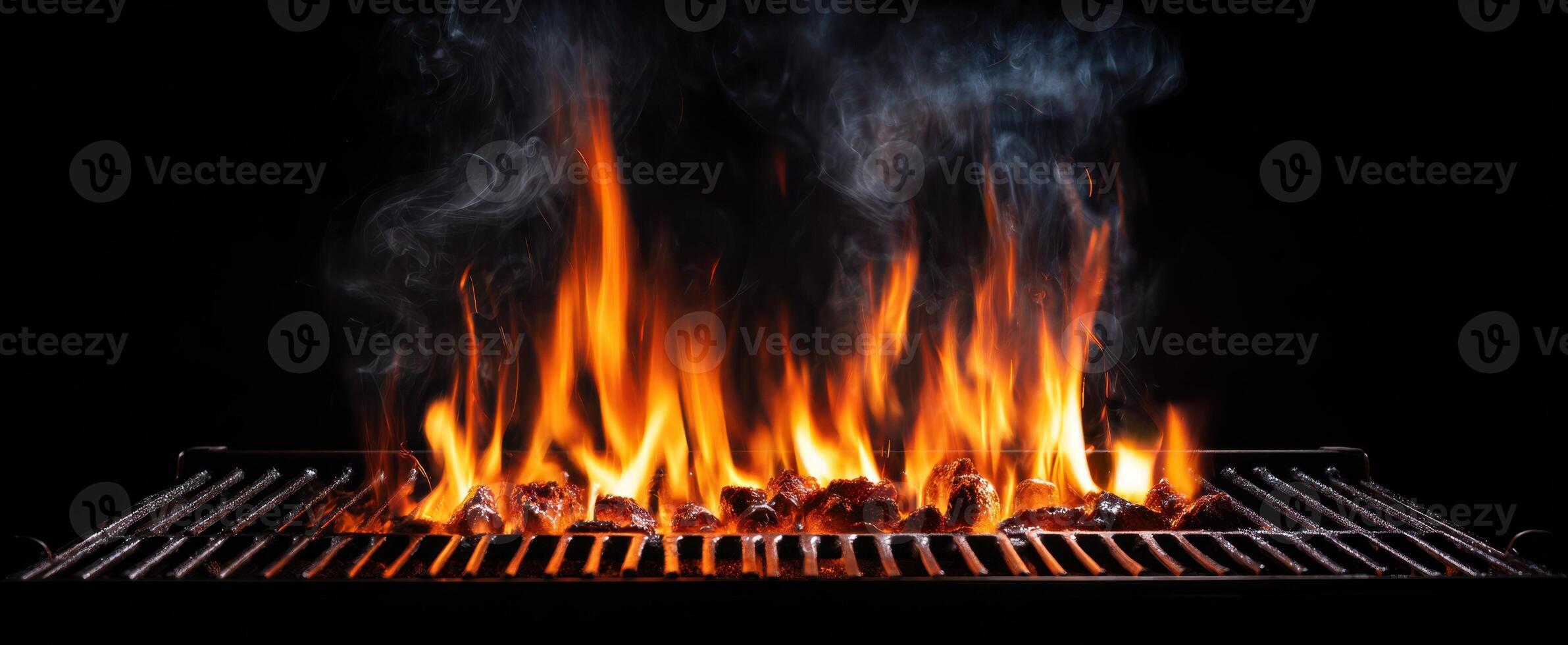 The mesmerizing flames dancing atop a grill filled with succulent meat. photo