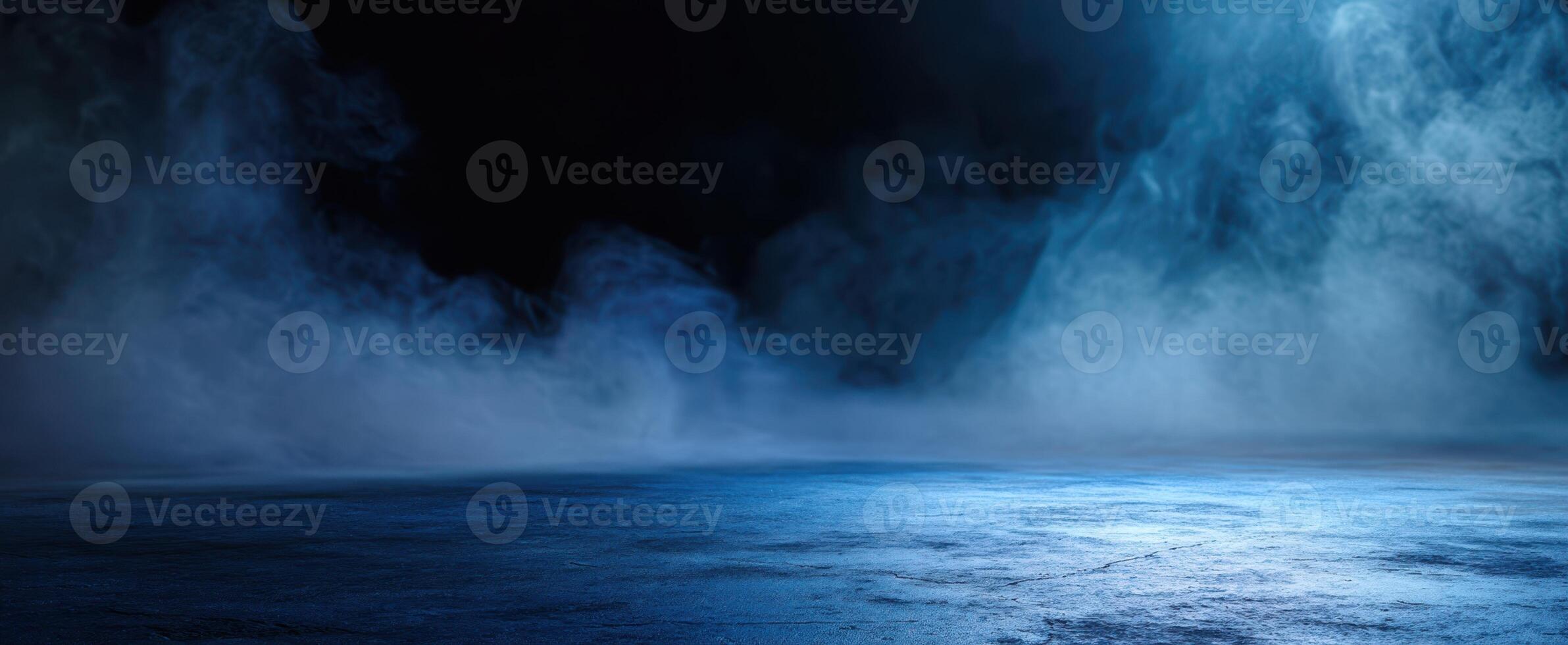 The ethereal blue mist enveloping a tranquil and mysterious landscape. photo