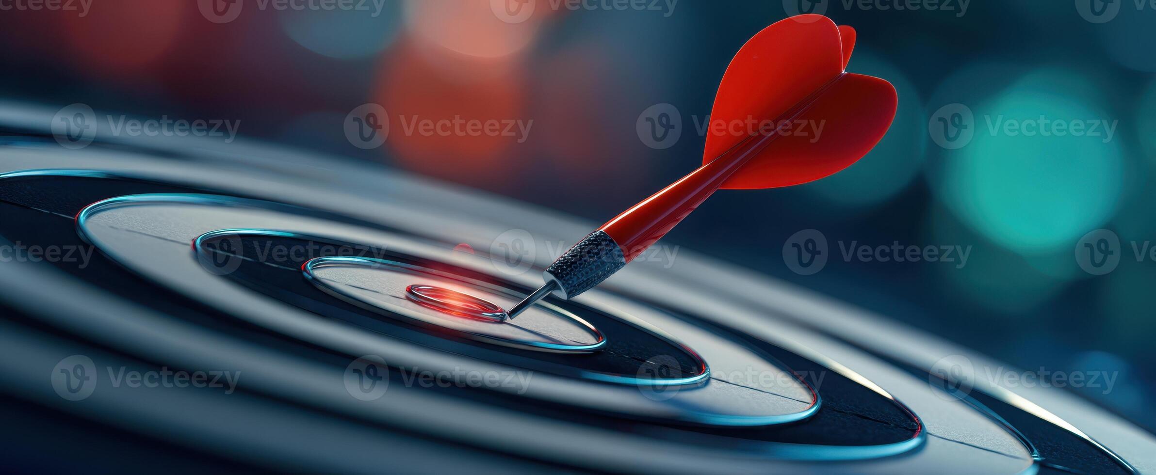 The dart hitting the bullseye on a target symbolizing success and achievement. photo