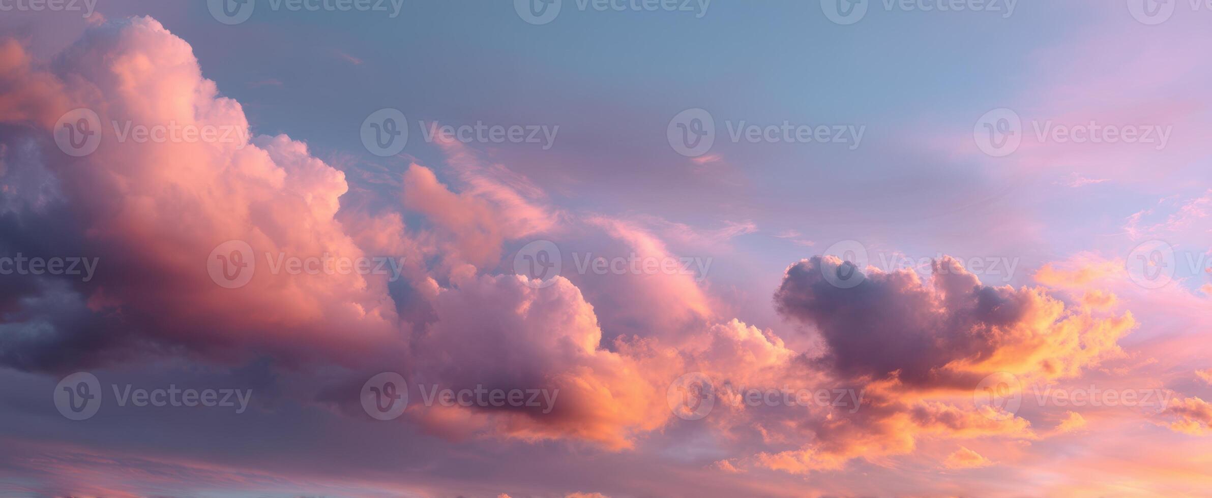 The stunning clouds painted in pastel hues during a picturesque sunset. photo