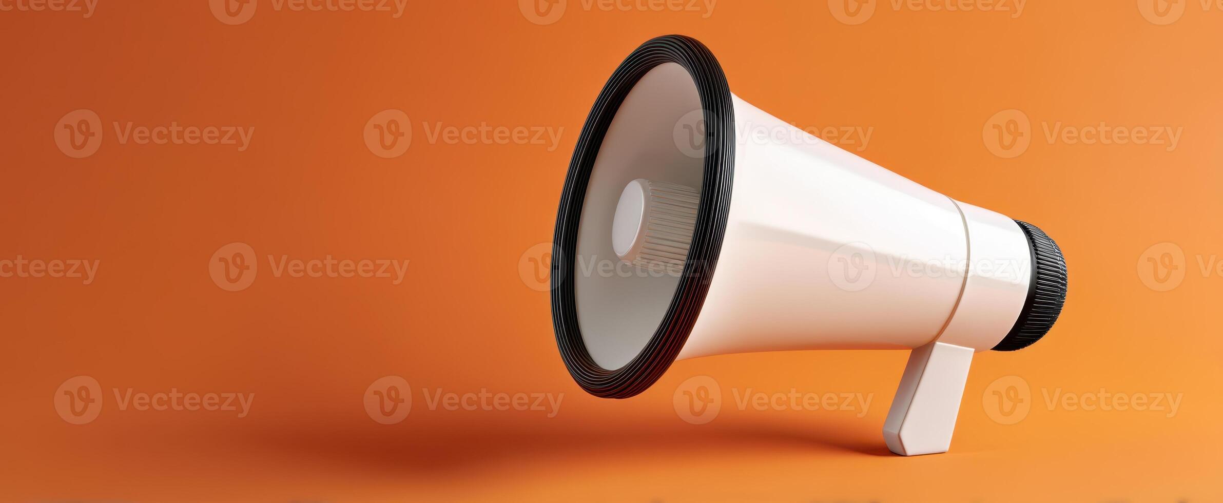 The Modern Megaphone on a Vibrant Orange Background for Effective Communication photo