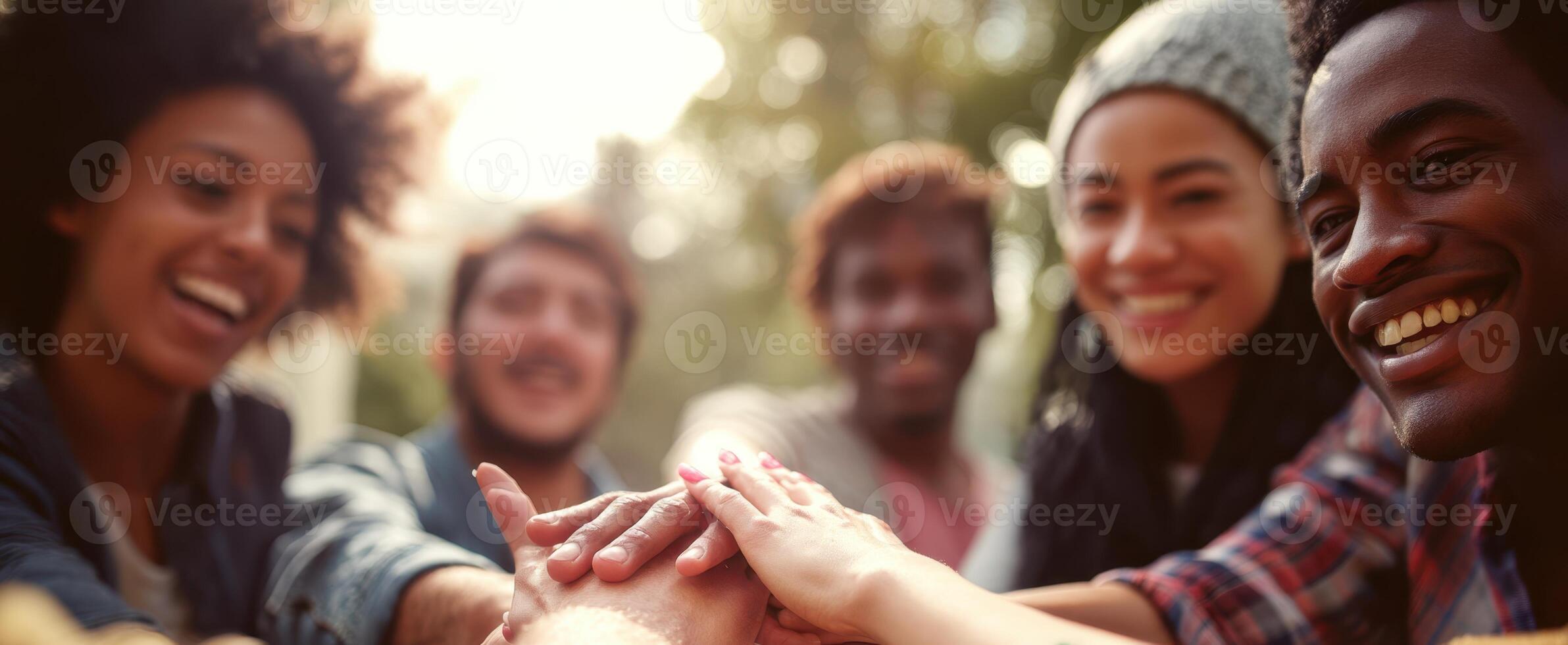 The joyful moment of friends uniting in a display of teamwork and connection. photo