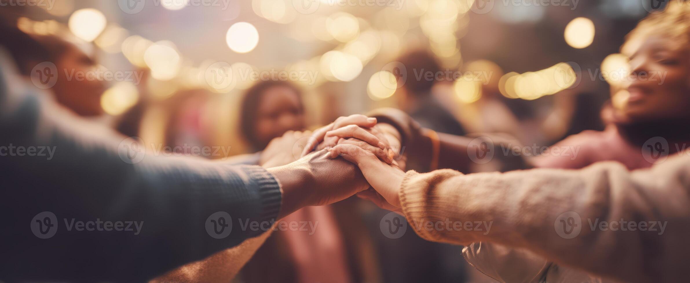 The unity of hands coming together in a joyful celebration of community. photo