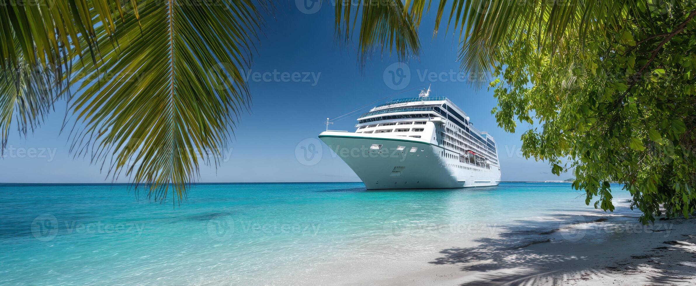 The luxurious cruise ship sailing in a tropical paradise under a clear blue sky. photo