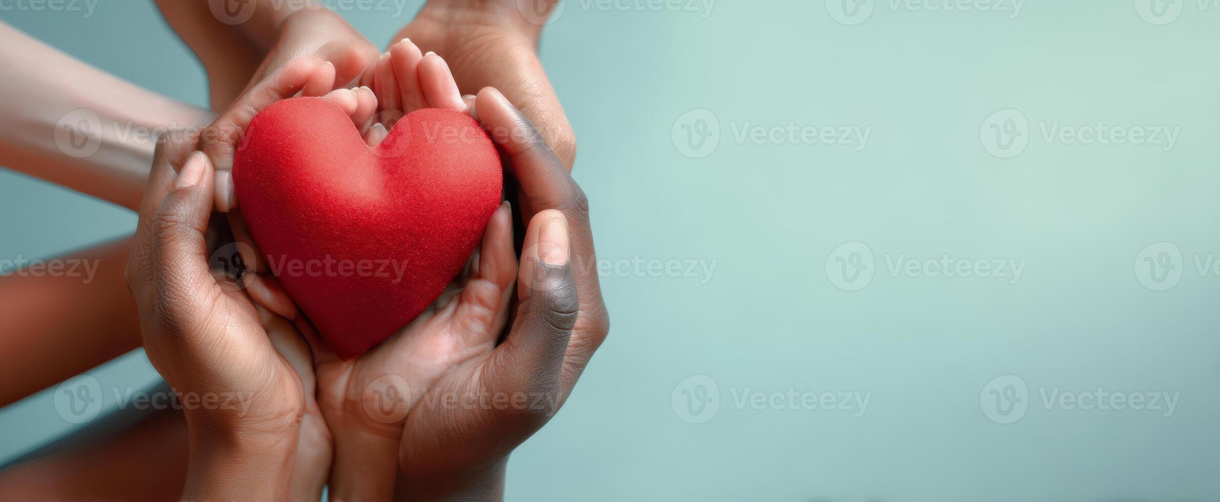 The Hands of Unity Surrounding a Heart Symbolizing Love and Compassion photo