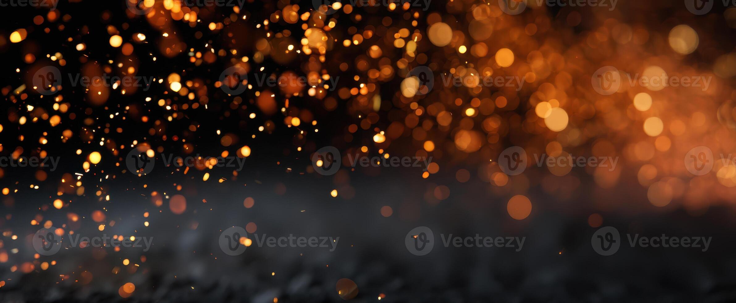 The mesmerizing glow of shimmering particles in a dark background. photo