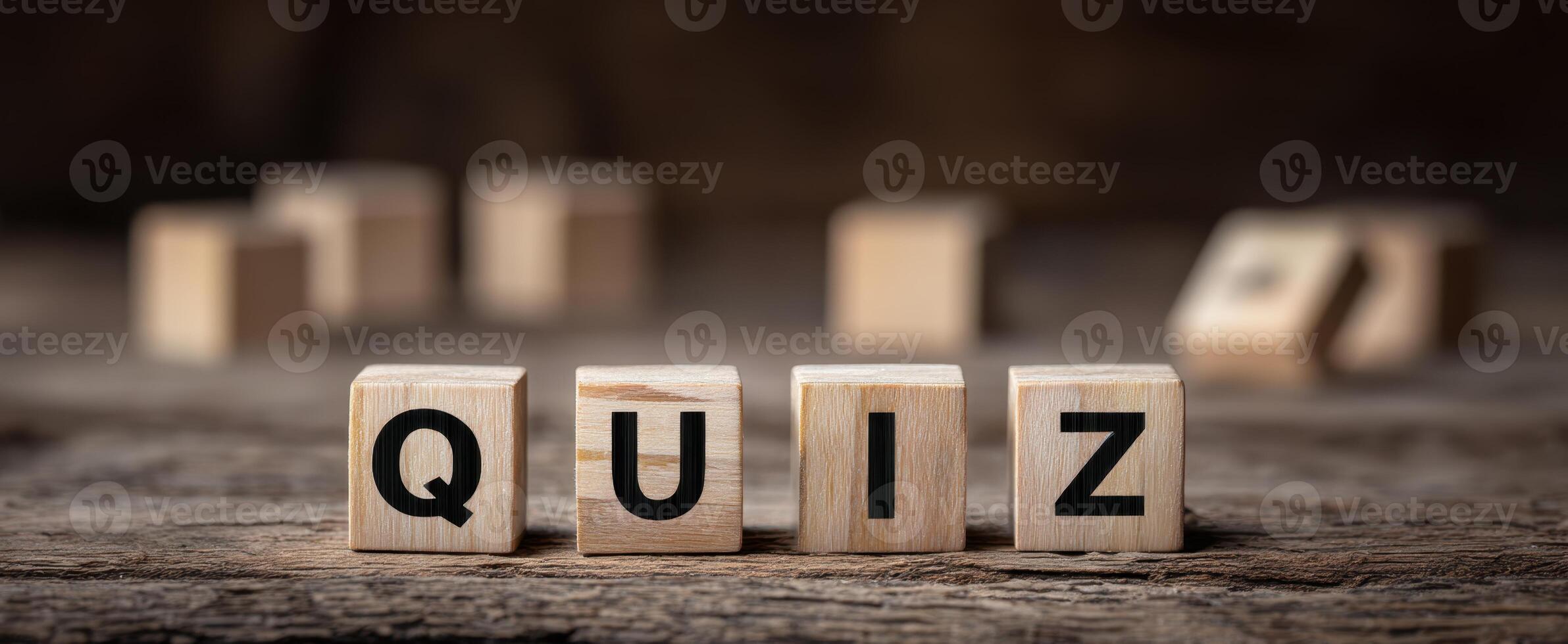 The wooden blocks spelling QUIZ on a rustic background. photo
