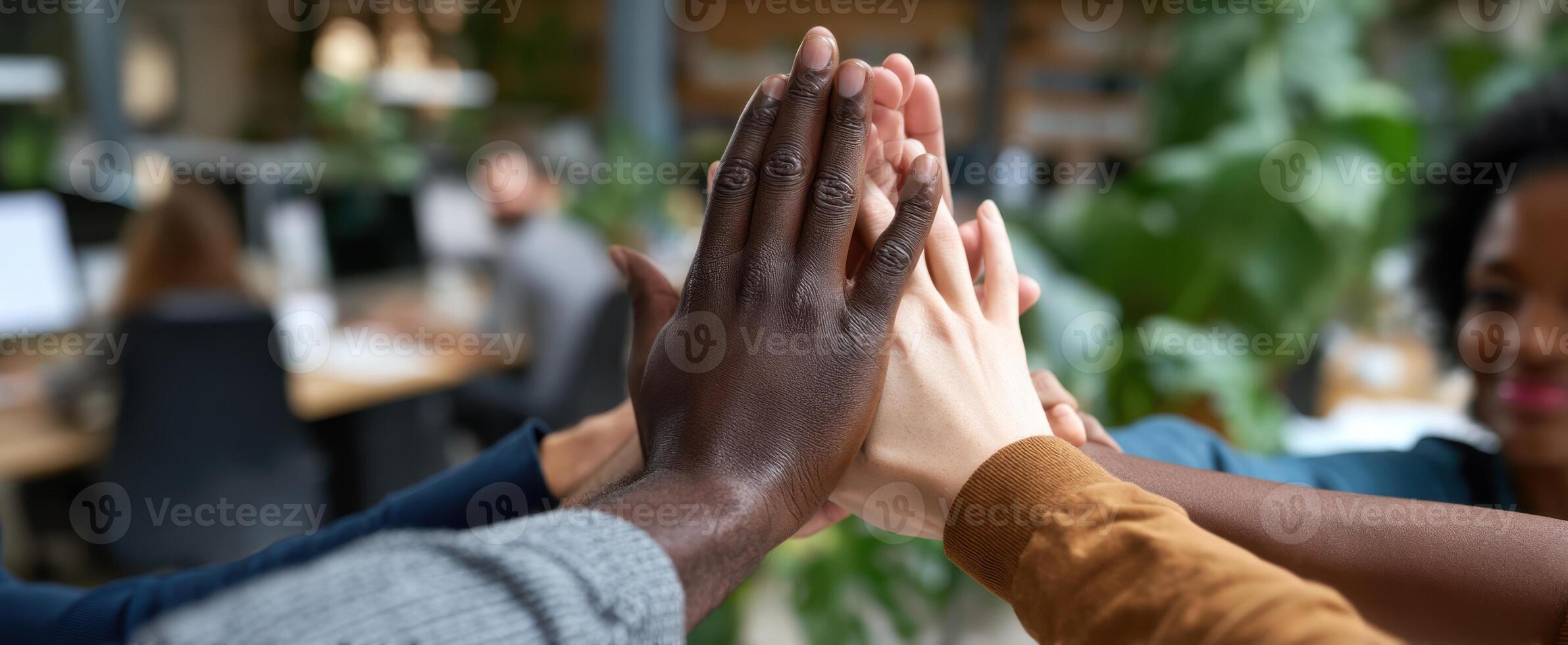 The hands of collaboration unite in a modern office environment. photo