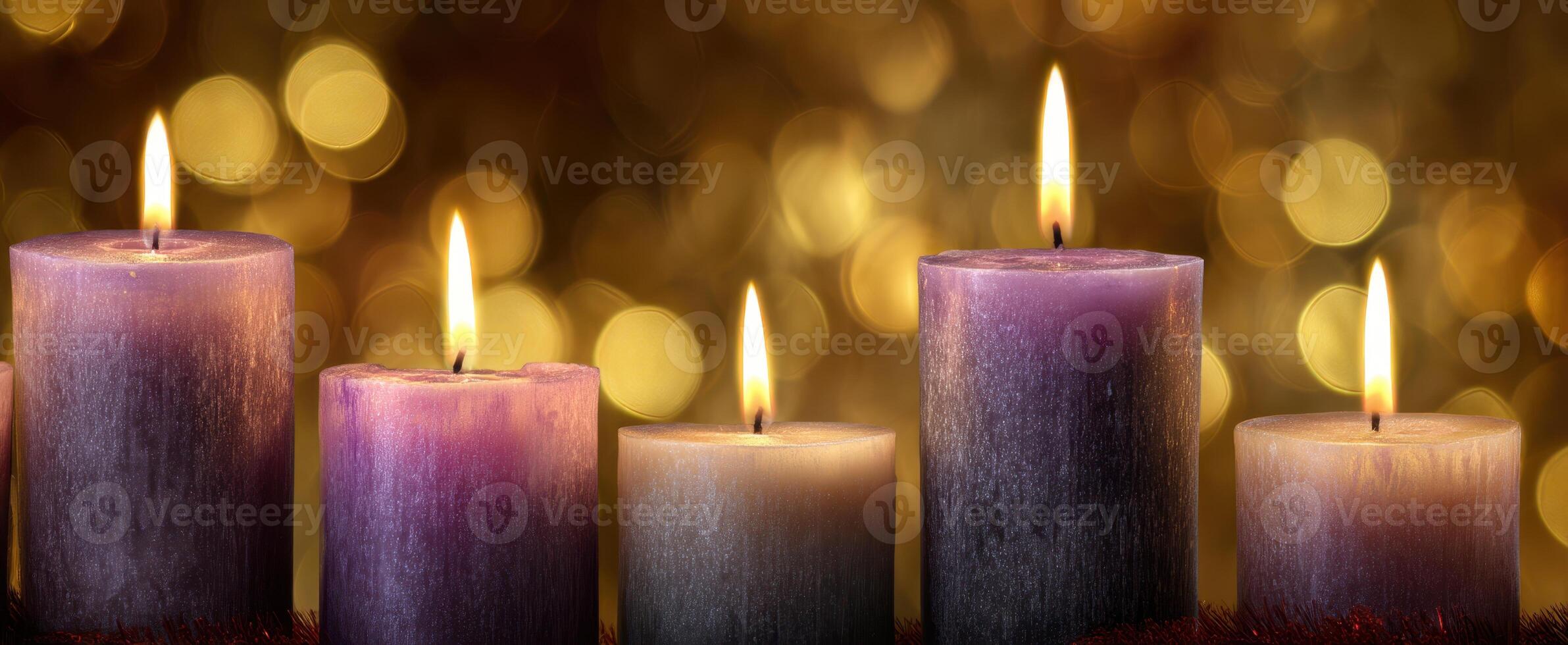 The tranquil glow of purple candles illuminating a festive background. photo