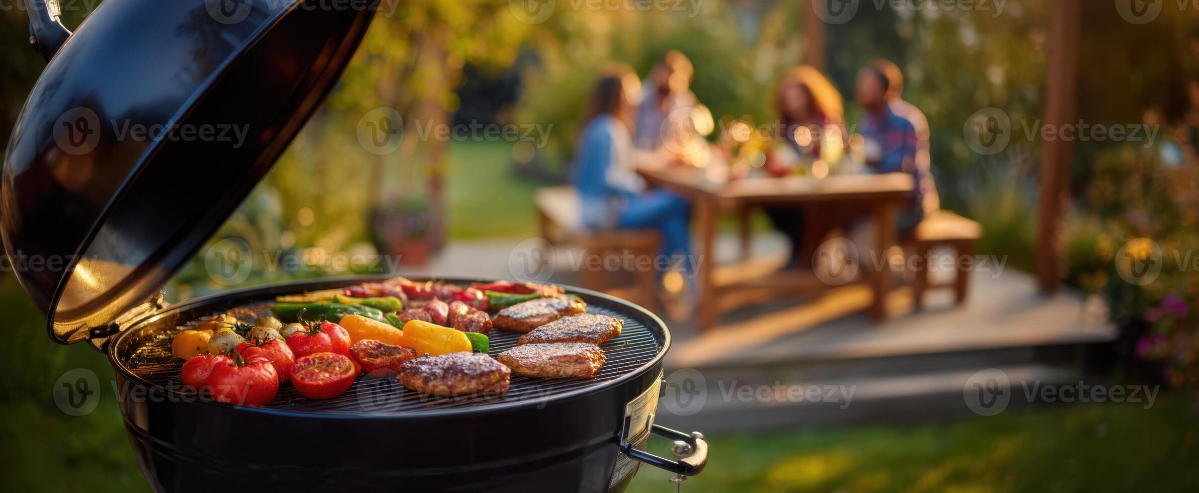 The grilling experience with friends in a beautiful backyard setting photo
