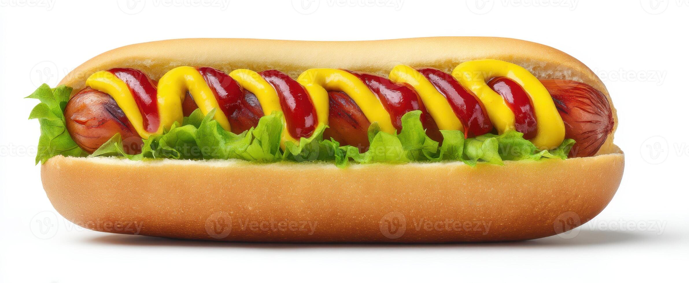 The delicious hot dog topped with mustard and ketchup on a fresh bun. photo
