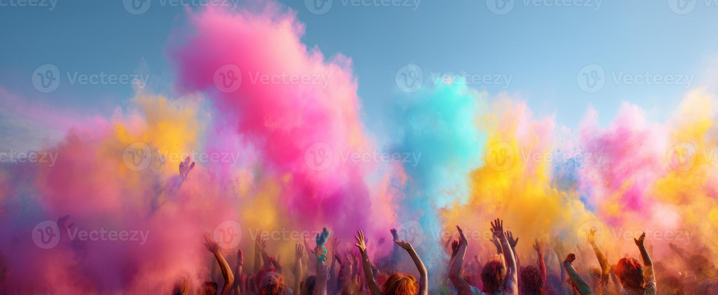 The Celebration of Colors with Joyful People and Vibrant Powder Clouds photo