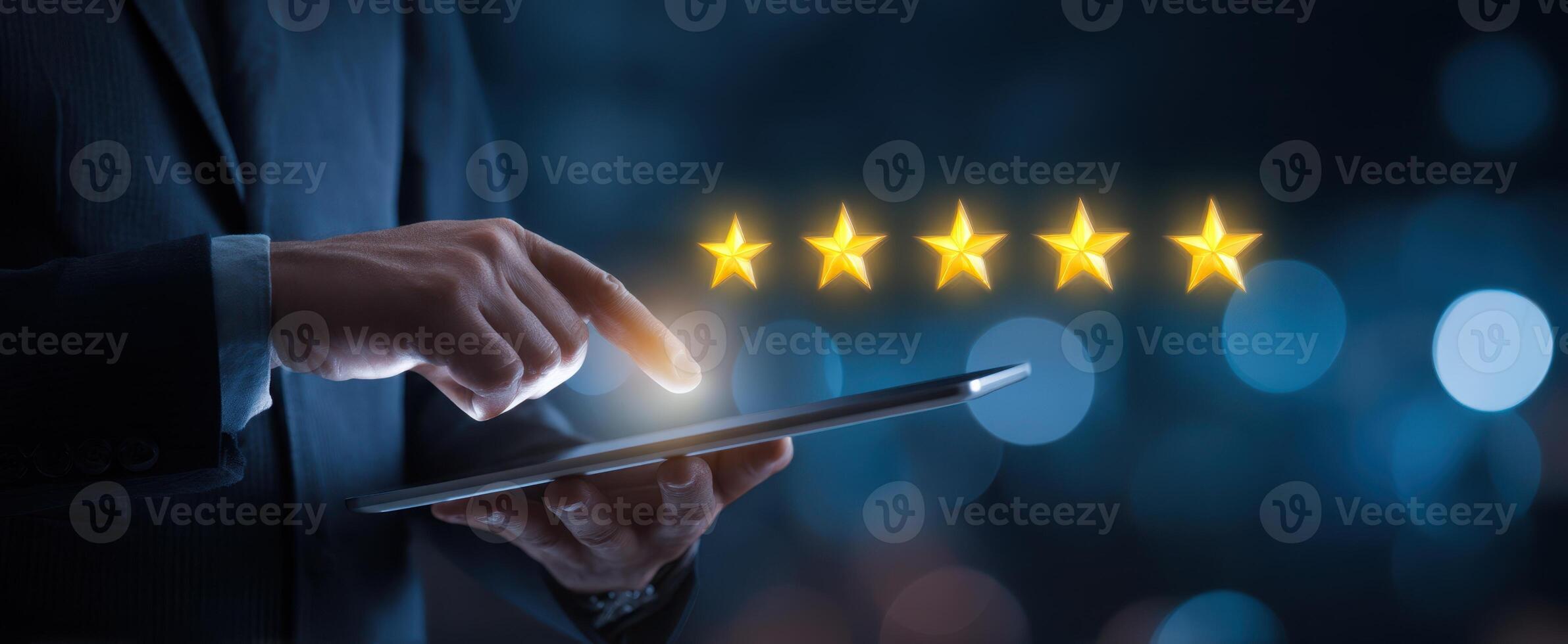 The Businessman Interacting with Digital Five-Star Rating on Tablet Device. photo