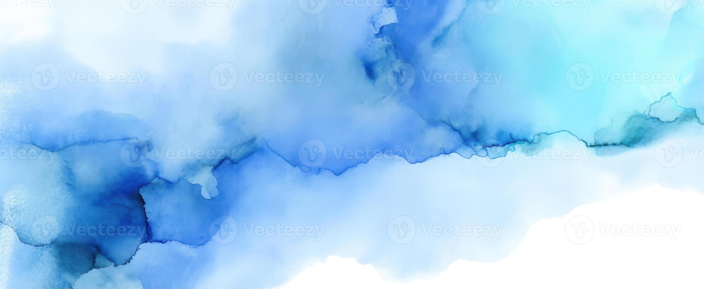 The abstract blue watercolor texture creating a calming artistic background. photo