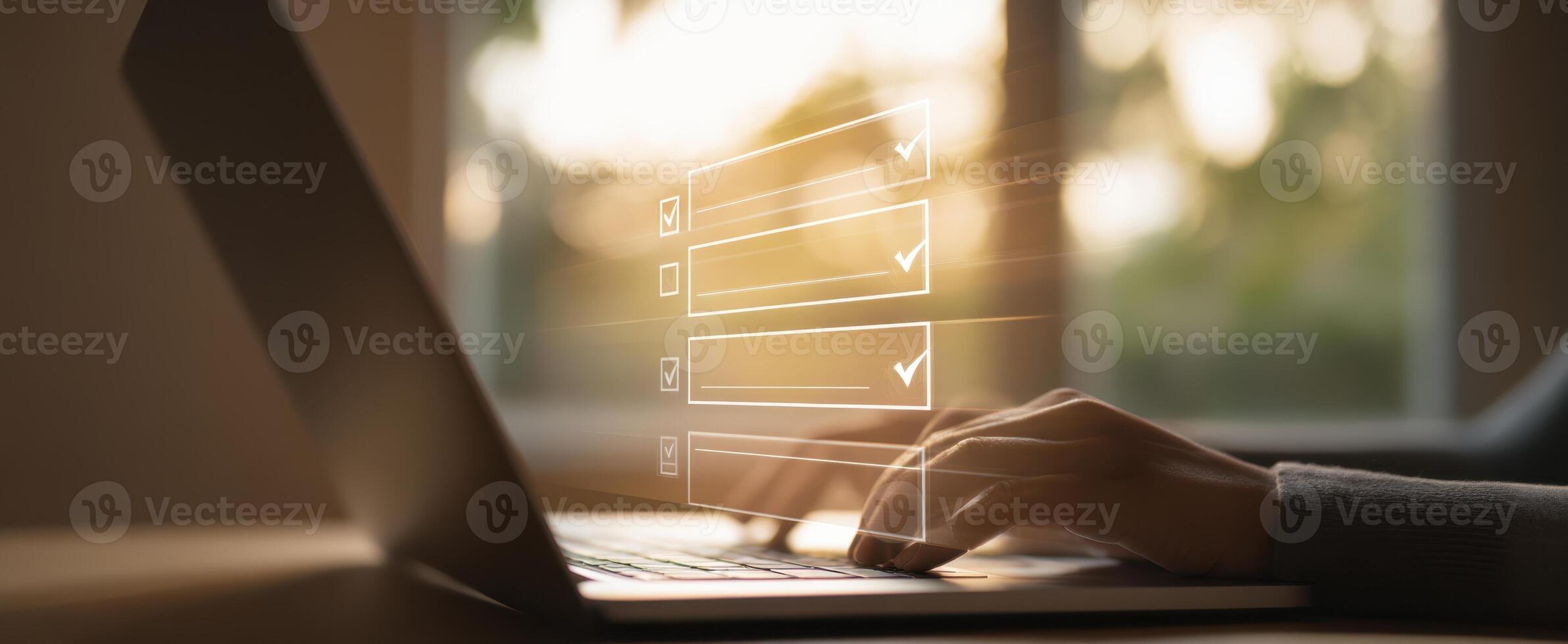 The laptop displaying a checklist for efficient task management and productivity. photo