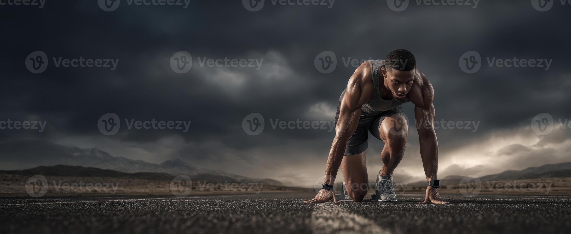 The athletic runner preparing for a sprint under dramatic cloudy skies. photo