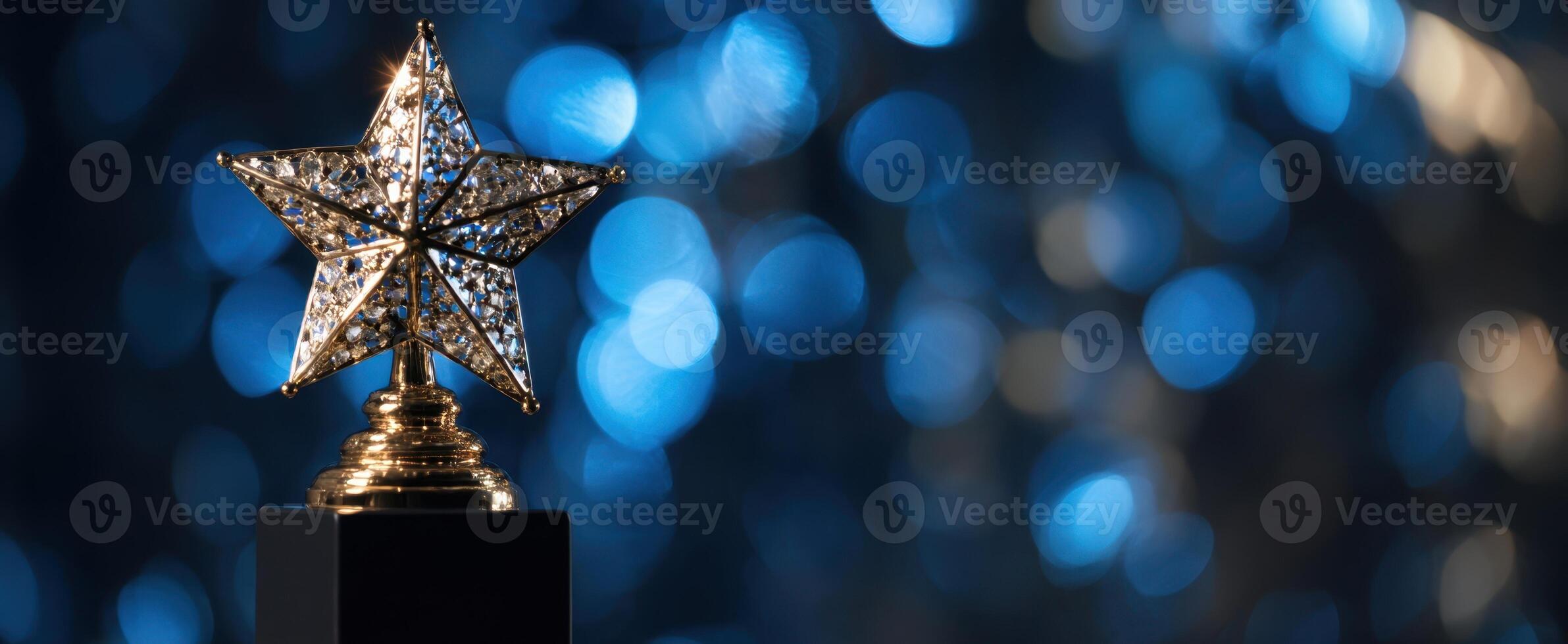 The sparkling star trophy shining against a soft blue bokeh background. photo