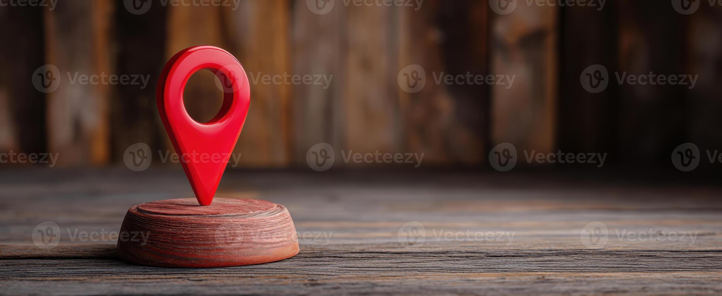 The Red Location Marker on a Wooden Base for Navigation and Mapping photo