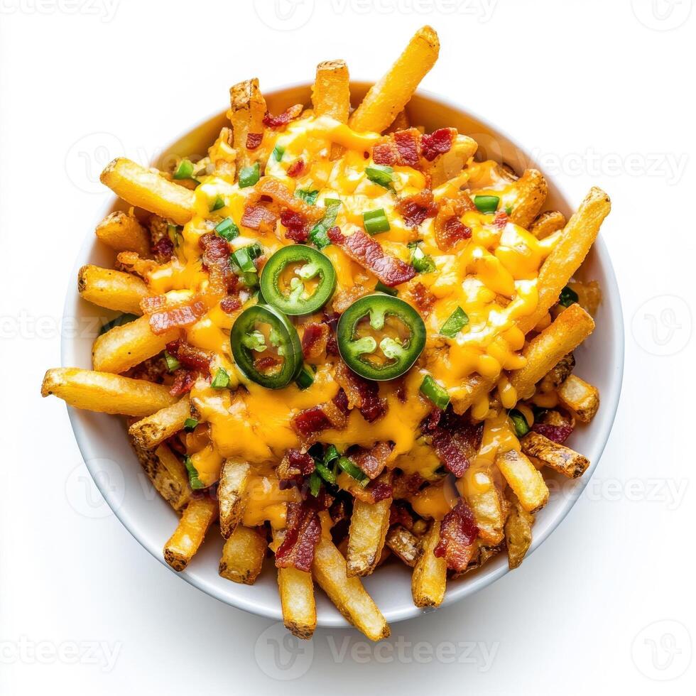 Loaded cheese fries with cheddar, crispy bacon bits, and jalapenos arranged on white background photo