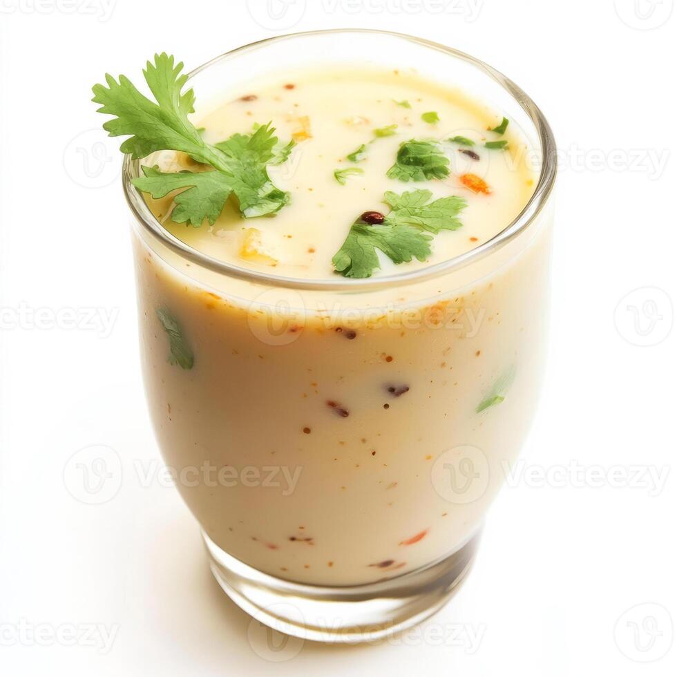 A glass of yogurt with a garnish of cilantro photo