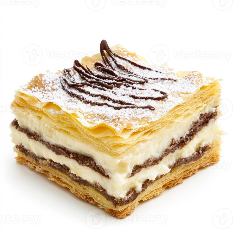 A piece of pastry with cream and powdered sugar photo