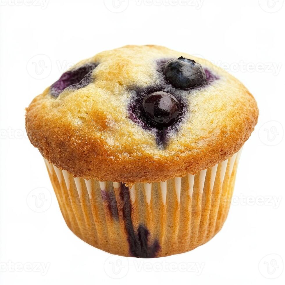 A close-up of a single perfect blueberry muffin, its top golden brown and bursting with plump photo