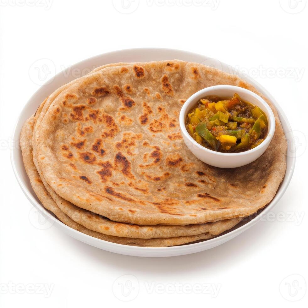 A close-up of a flaky paratha, with layers of whole wheat dough and a golden brown color, served photo