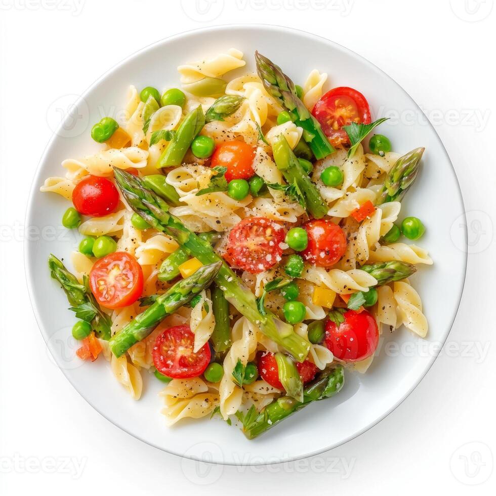 A plate of colorful pasta primavera, featuring a medley of fresh vegetables, such as asparagus, peas photo