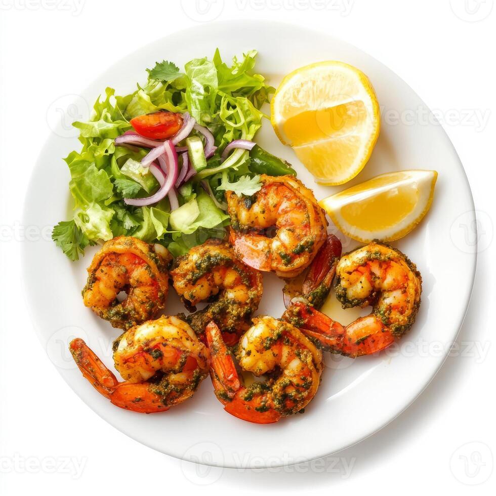 A plate of prawn cafreal, with prawns marinated in a green masala and fried until crispy, served photo