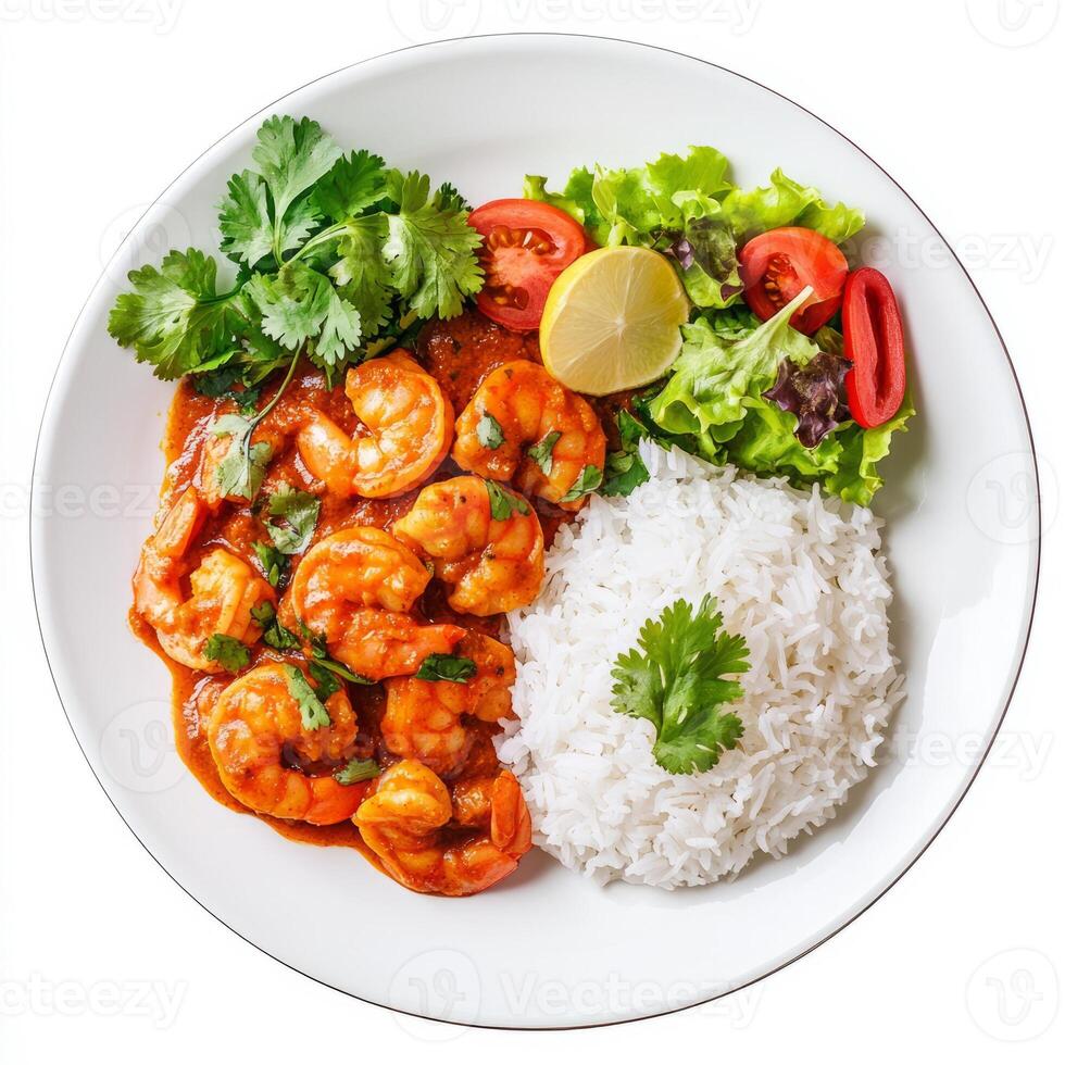 A plate of prawn masala fry, with prawns cooked in a spicy masala sauce, served with rice and a side photo