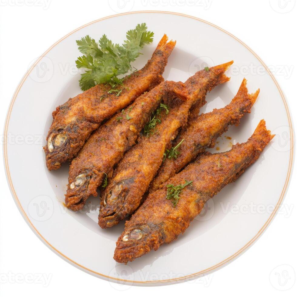 A plate of fish amritsari, with fish marinated in spices and gram flour, fried until crispy, photo