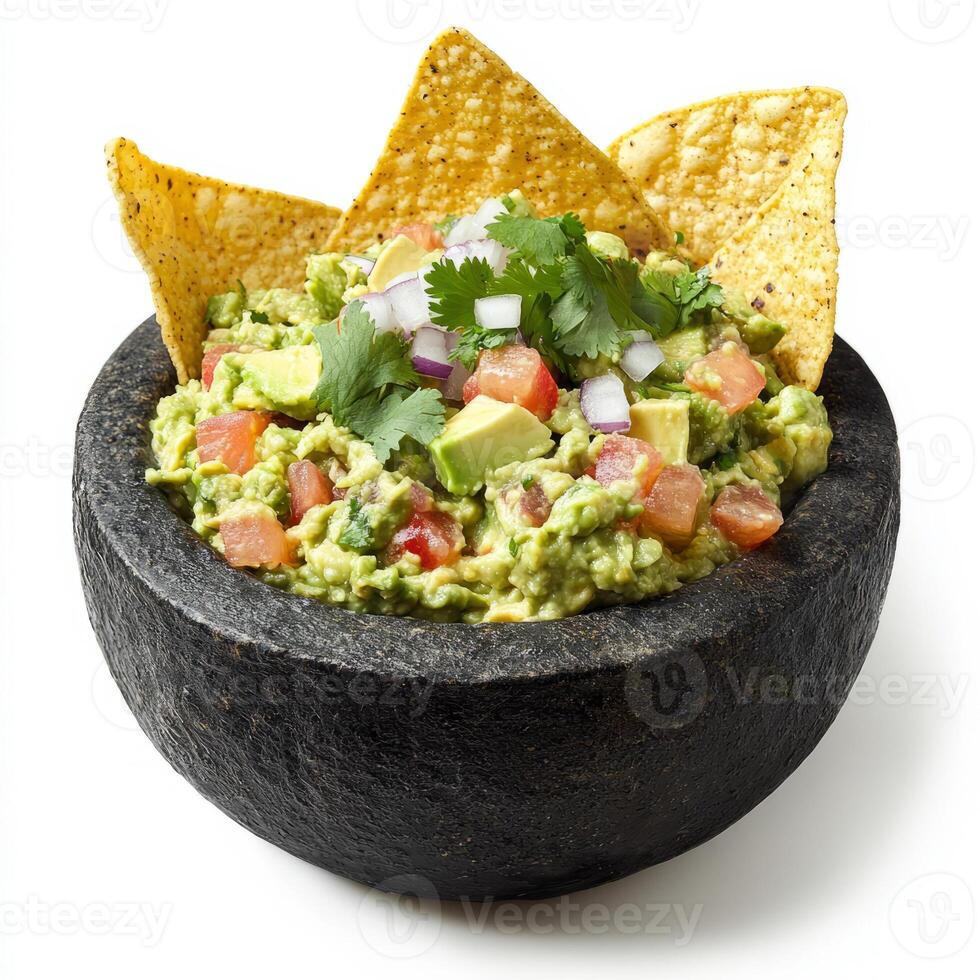 A close-up of a creamy guacamole dip, with ripe avocados, diced tomatoes, onions, cilantro, and lime photo