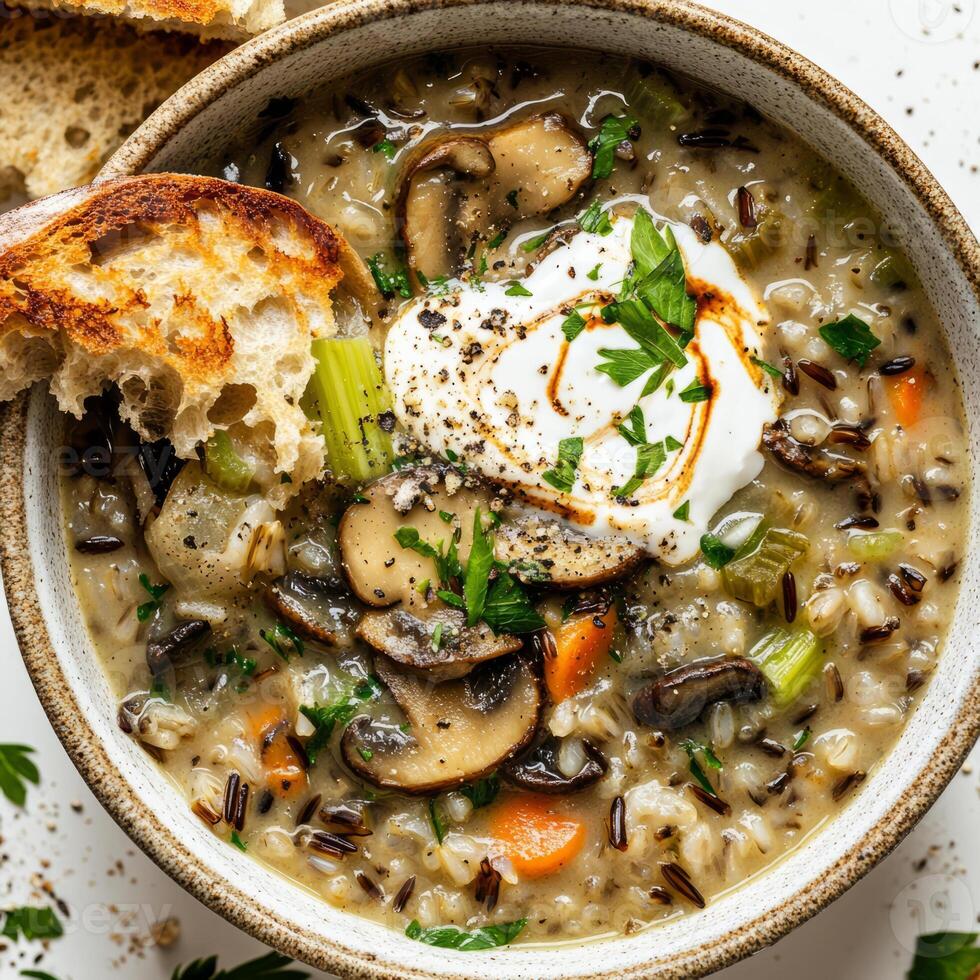Wild rice soup with mushrooms and vegetables photo