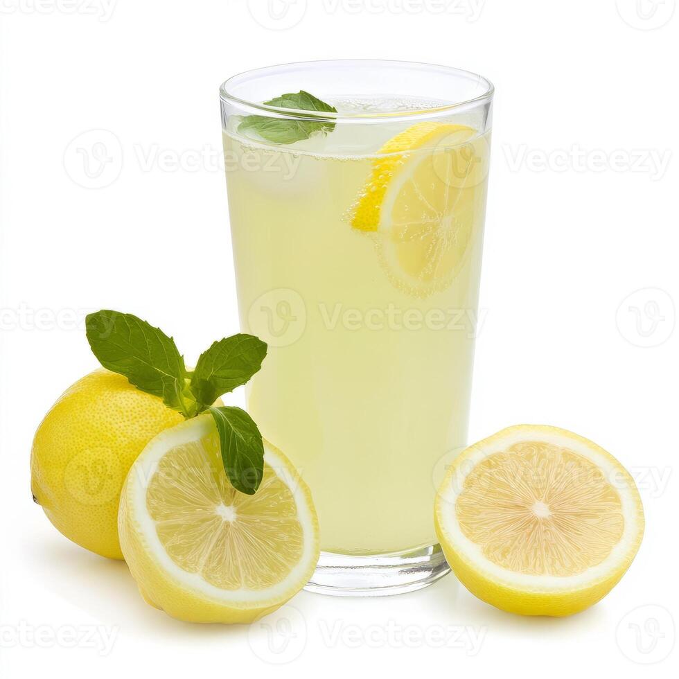 A glass of lemonade with slices of lemons photo