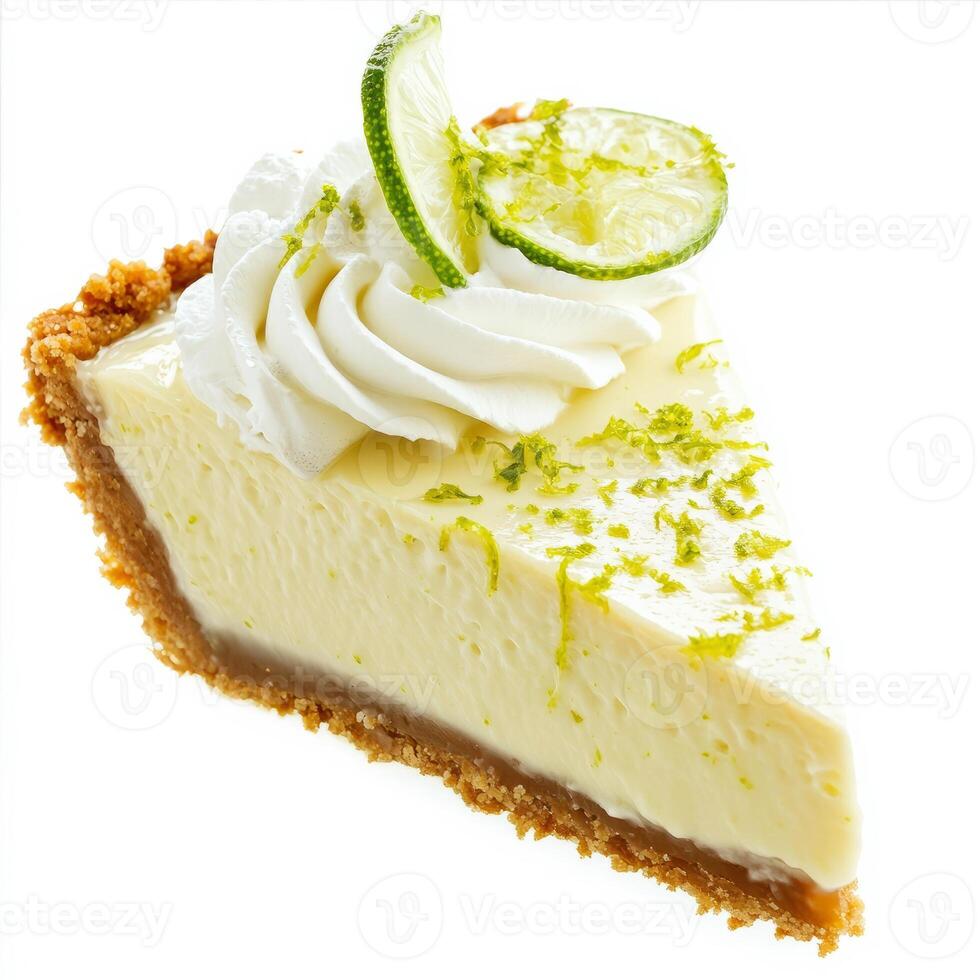 An enticing shot of a slice of key lime pie, its creamy filling resting on a graham cracker crust, topped with whipped cream and lime zest. The key lime pie, with its tangy and sweet filling, presents photo