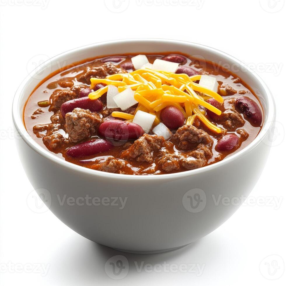 A bowl of hearty chili con carne, with tender chunks of beef, kidney beans, and a medley of spices, simmered in a rich tomato-based sauce, topped with shredded cheese and onions, isolated on clean photo