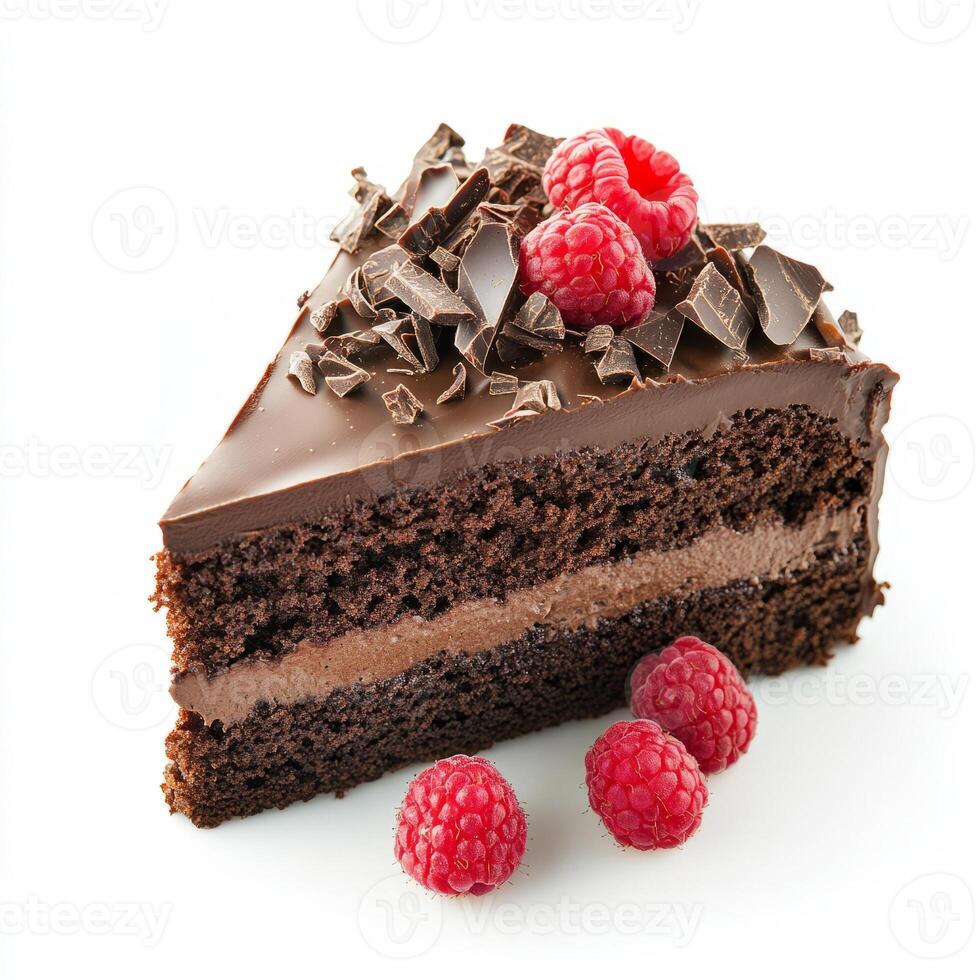 A tantalizing shot of a slice of decadent chocolate hazelnut cake, adorned with chocolate shavings and fresh raspberries. The chocolate hazelnut cake, with its rich, nutty flavor and moist texture, photo