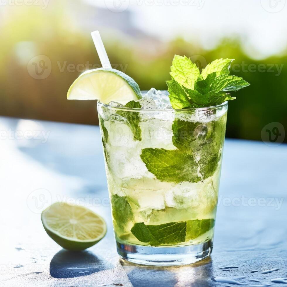 A glass of refreshing mojito, garnished with fresh mint leaves, lime wedges, and a splash of rum, resting on a sunny outdoor table. The mojito, with its refreshing mint and lime flavors, offers a photo