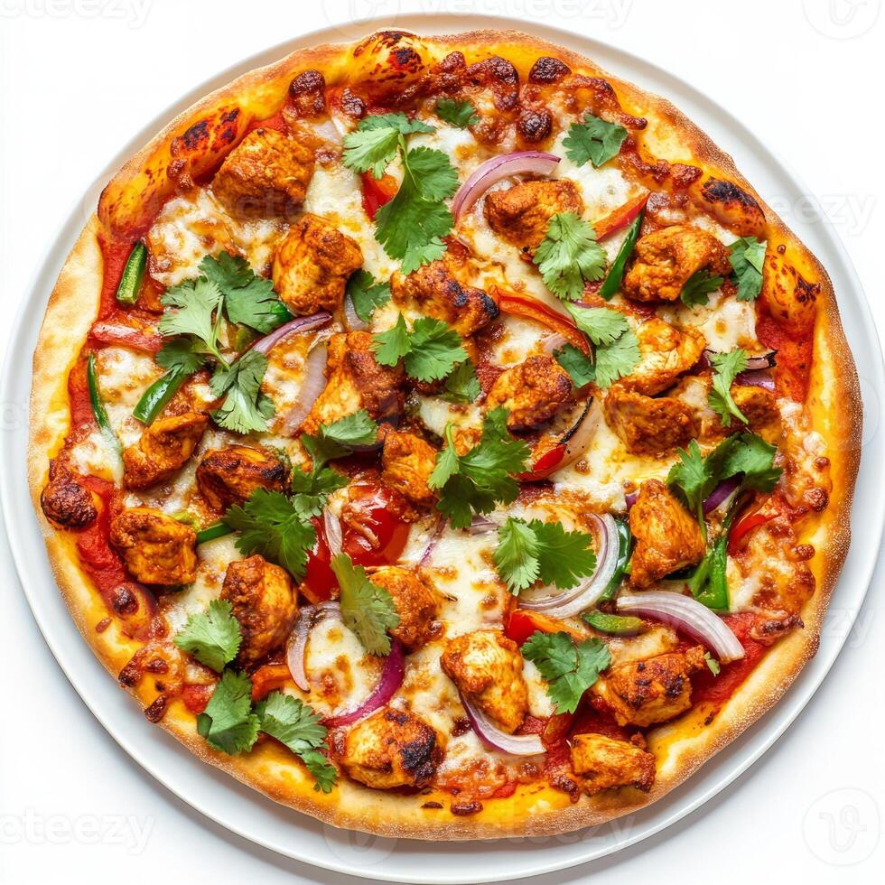 A plate of chicken tikka masala pizza, with a pizza topped with chicken tikka masala, onions, and peppers, garnished with cilantro, isolated on clean white background. photo