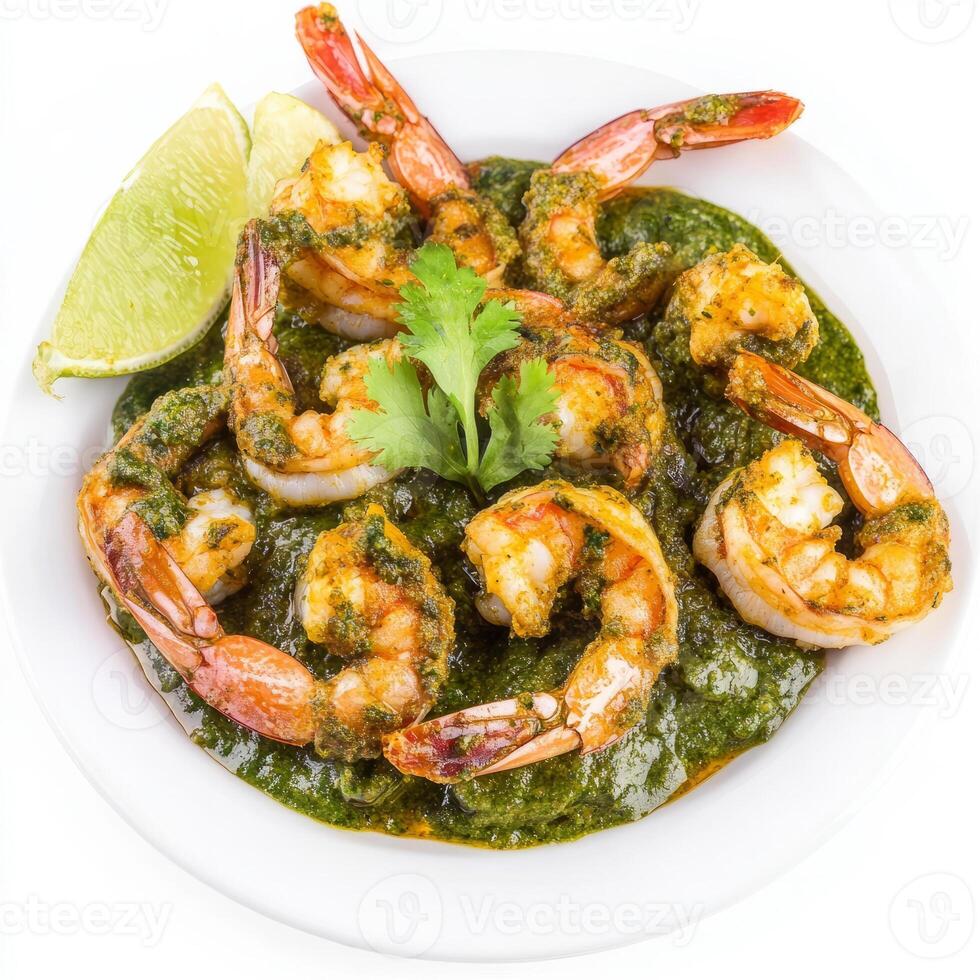 A plate of prawn cafreal, with prawns marinated in a green masala and fried until crispy, isolated on clean white background. photo