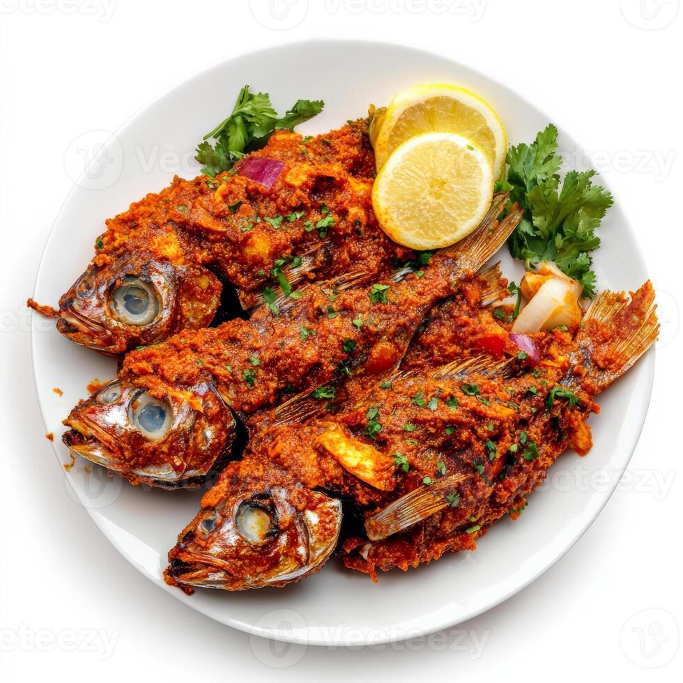 A plate of fish recheado, with fish stuffed with a spicy masala and fried until crispy, isolated on clean white background. photo