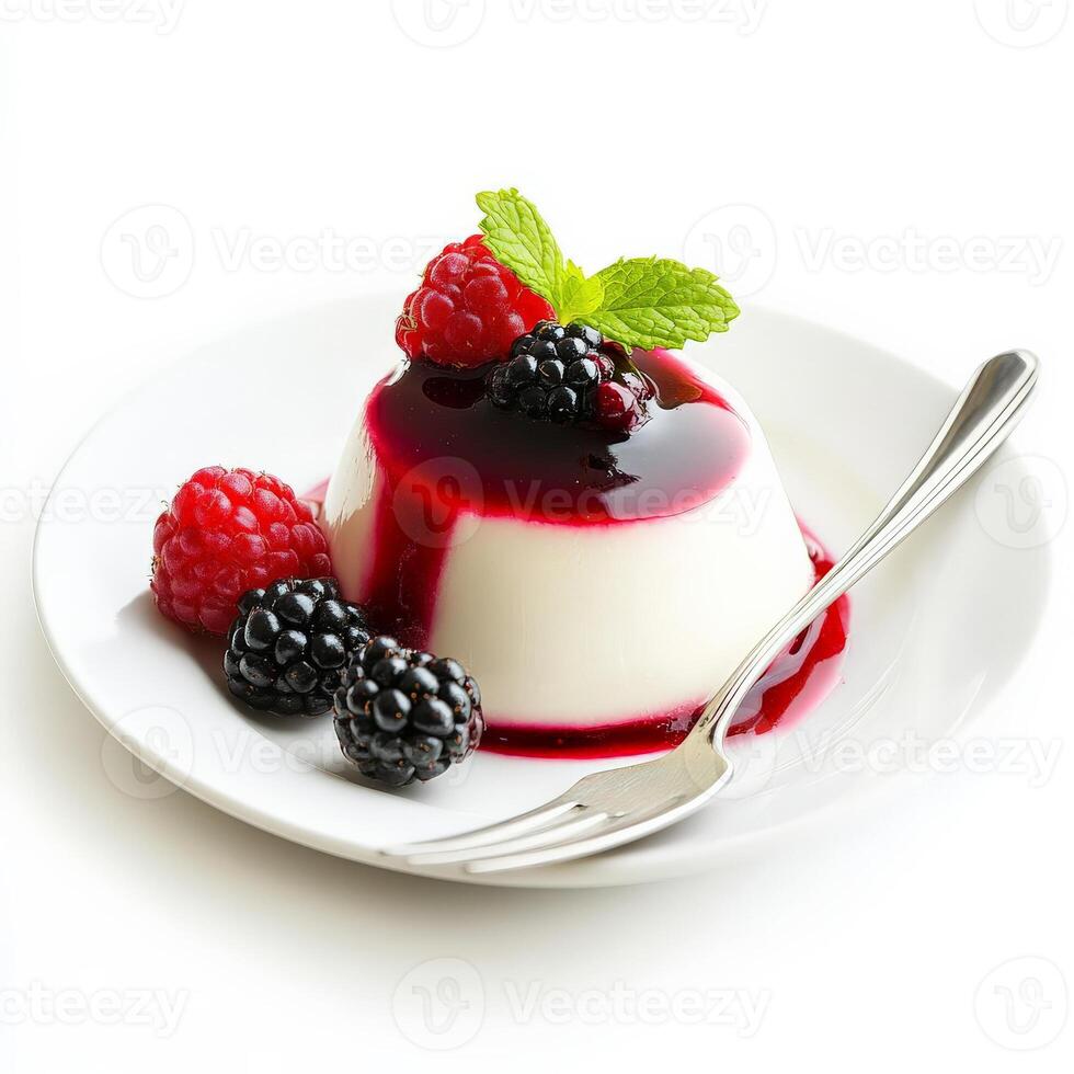 A close-up of a slice of creamy panna cotta, a smooth and delicate Italian dessert, flavored with vanilla and topped with a berry coulis, served in a small glass and garnished with fresh berries and a photo