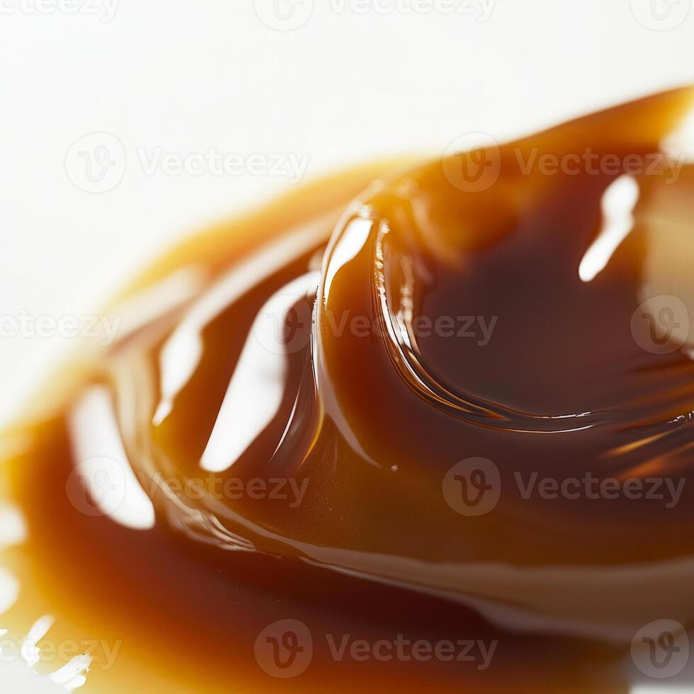 A close-up of a perfectly plated sauce, highlighting its texture, sheen, and the artistry of its application, whether swirled, dripped, or brushed, showcasing the sauce as an integral part of the dish photo