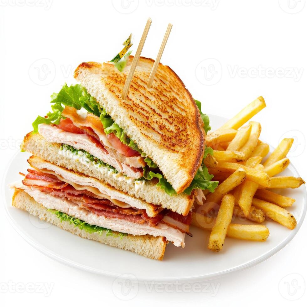 A classic club sandwich stacked with toasted bread, crispy bacon, sliced turkey, fresh lettuce, tomato, and mayonnaise, cut into triangles and served with a side of golden fries. Isolated on clean photo