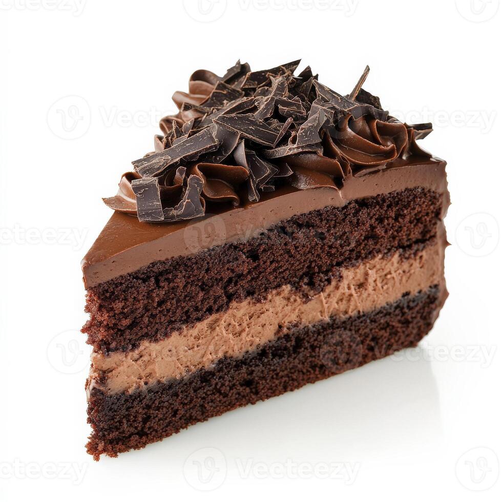 A decadent slice of chocolate cake with layers of moist, rich cocoa sponge and creamy chocolate ganache. The dessert is topped with dark chocolate shavings for an indulgent finish. Isolated on clean photo