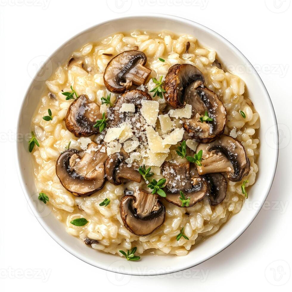 A bowl of creamy mushroom risotto, made with Arborio rice, wild mushrooms, Parmesan cheese, and fresh herbs, topped with a drizzle of truffle oil. Isolated on clean white background photo