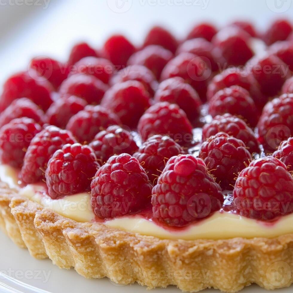 A tart with raspberries on top photo