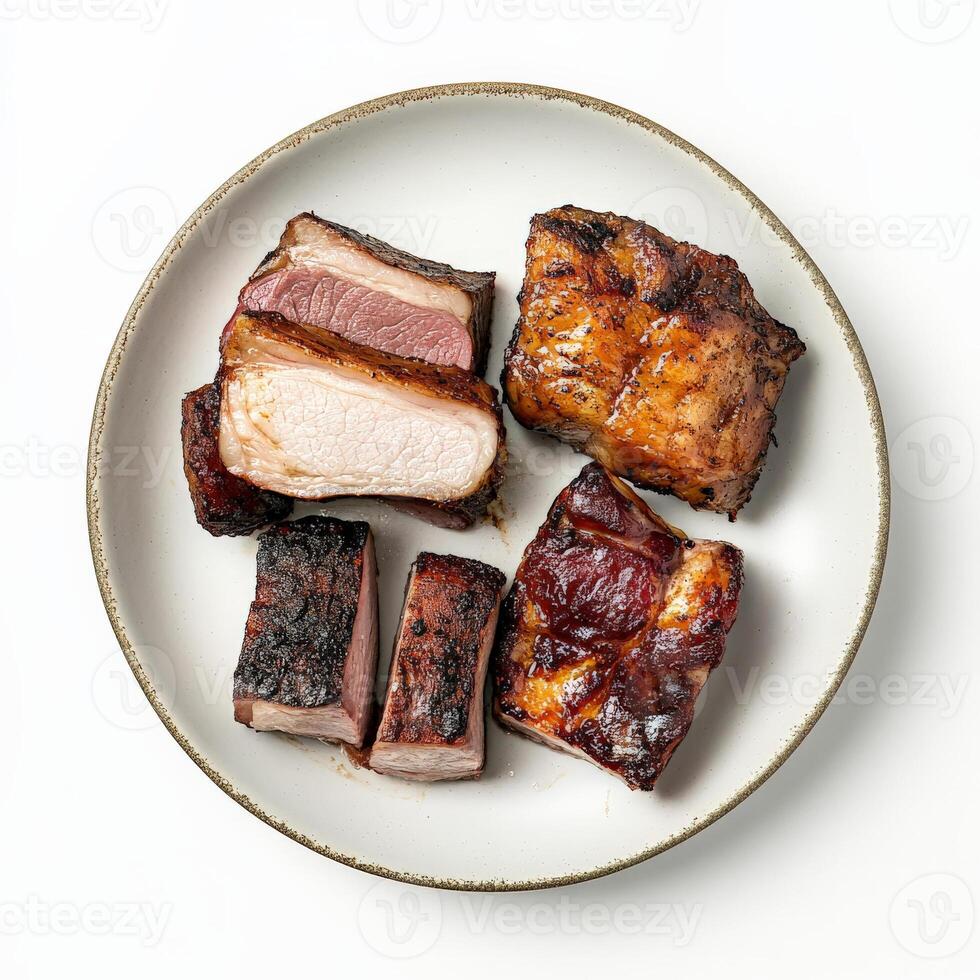 A small plate showcasing different cuts of a single animal, perhaps pork belly, loin, and tenderloin, each cooked in a unique way to highlight its distinct flavor and texture, emphasizing the photo