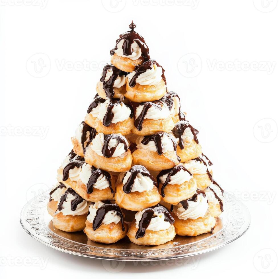 A close-up of a profiterole tower, a towering stack of small cream puffs, filled with vanilla pastry cream and drizzled with chocolate sauce, a festive and impressive French dessert, perfect for celebrations, showcasing the delicate pastry and the decaden photo