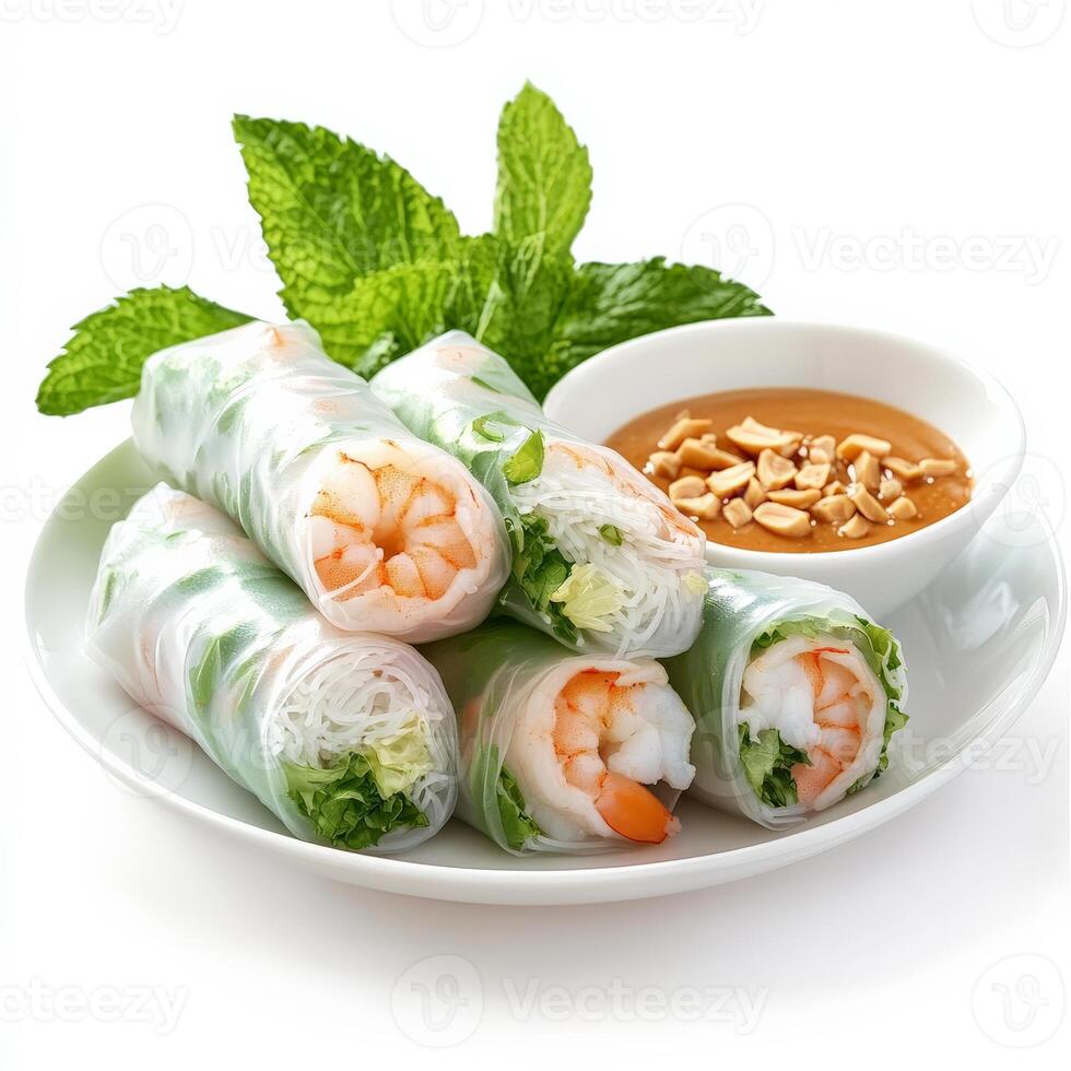 A plate of fresh spring rolls wrapped in rice paper, filled with shrimp, vermicelli noodles, lettuce, and mint, served with a peanut dipping sauce. A healthy and refreshing appetizer. Isolated on clean white background photo
